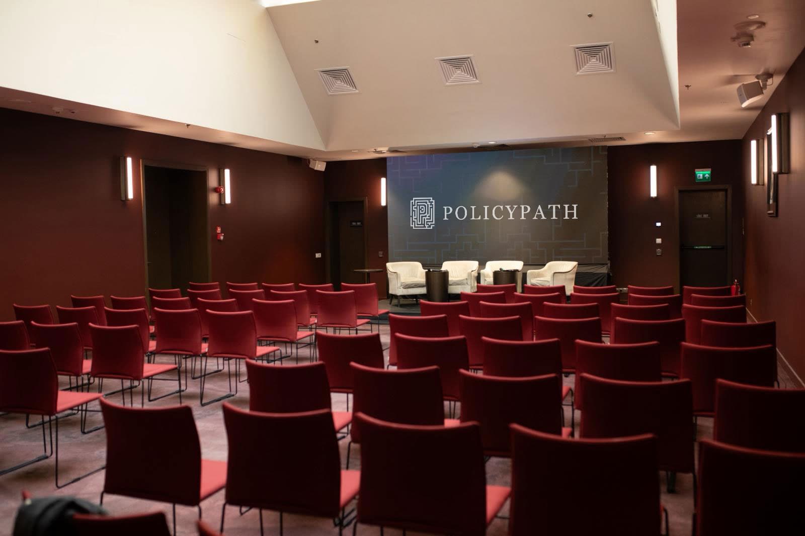 Hotel Marmorosch event hall with the Policypath logo on the back wall