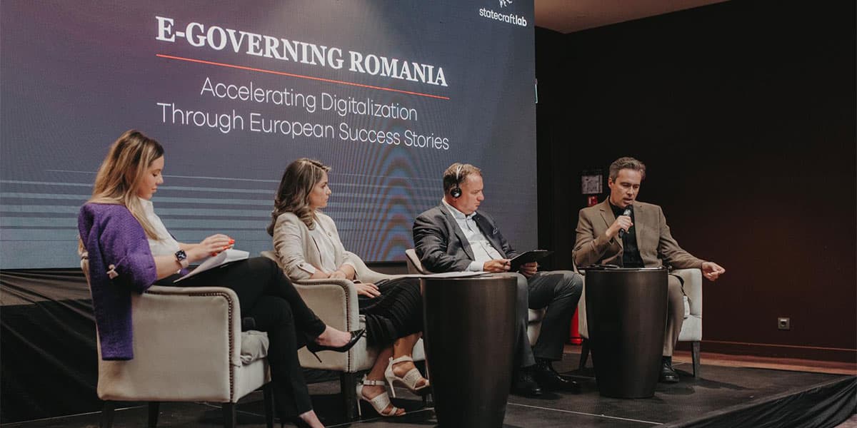The E-Governing Romania panel on stage
